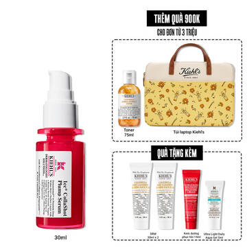 A vibrant red bottle of Kiehl's Hydro-Plumping Serum with a white pump dispenser. The product is centered against a plain white background, highlighting its bold packaging and label.​